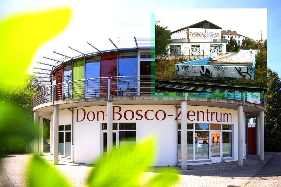 Modernes Don Bosco-Zentrum mit bunten Fenstern und Einschub einer graffiti-bedeckten Industrieanlage mit Gleisen.