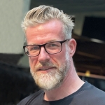 Portraitfoto vom Schulleiter Jens Bette